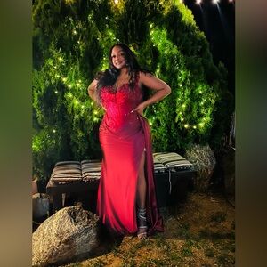 Size 16 burgundy dress. I am pictured in the dress.